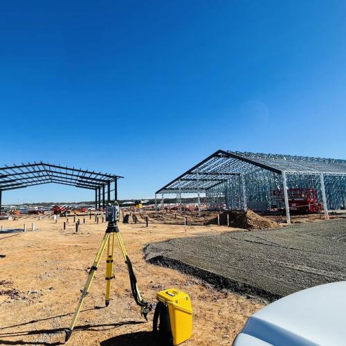 Construction site with our tripod-mounted equipment to measure and set out levels