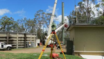 Verticality survey - third section being hoisted